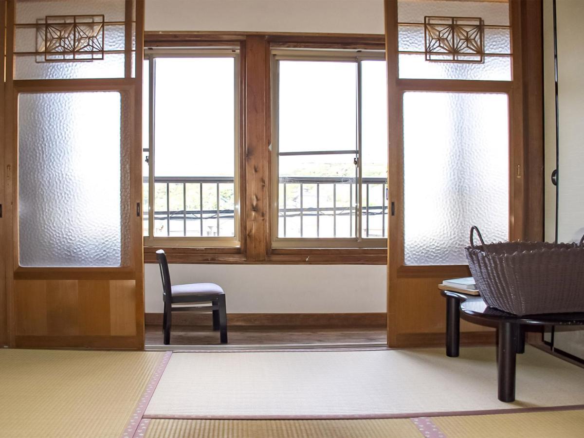 Guest Cafe Kuchikumano Hotel Kamitondacho Buitenkant foto