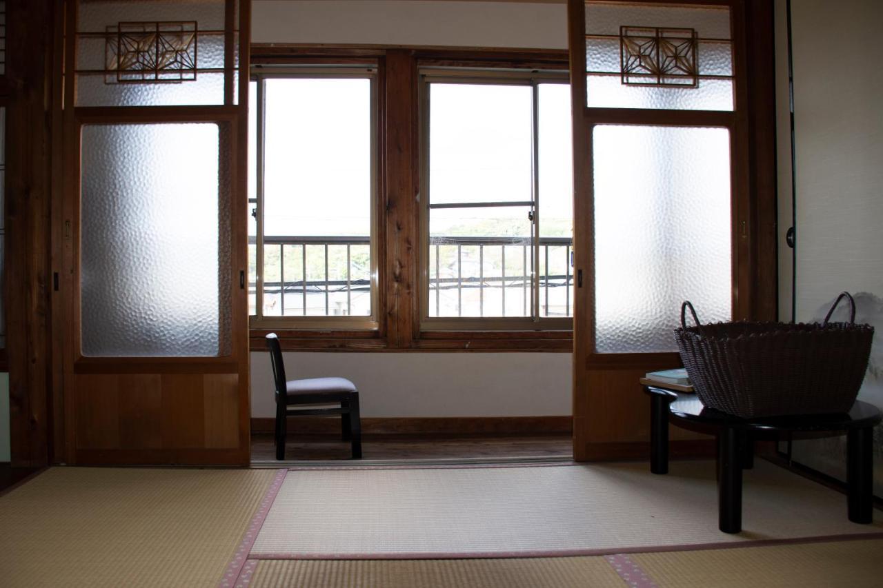 Guest Cafe Kuchikumano Hotel Kamitondacho Buitenkant foto
